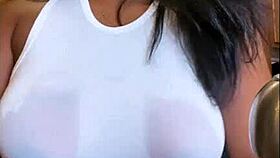 Thus, in the culinary setting Pena Torres moists her attire and shows her natural breasts